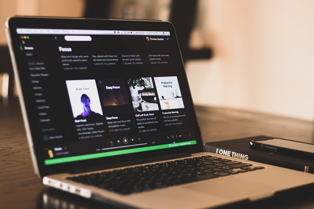 image of spotify on laptop computer