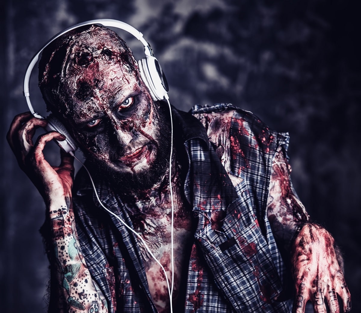 zombie wearing headphones - bring your podcast back from the dead