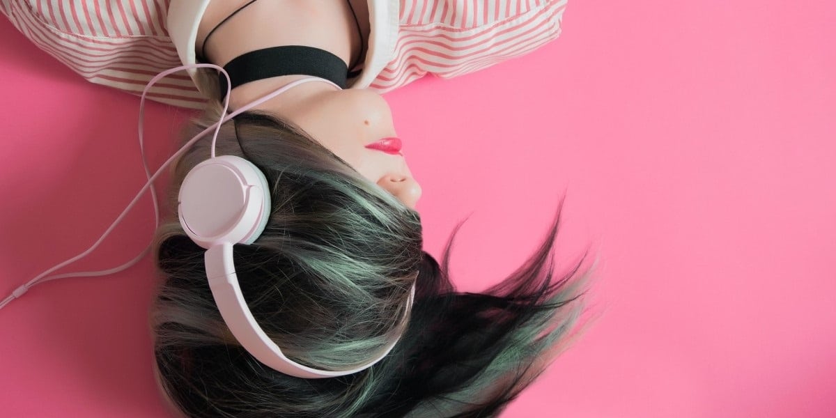 girl listening to headphones