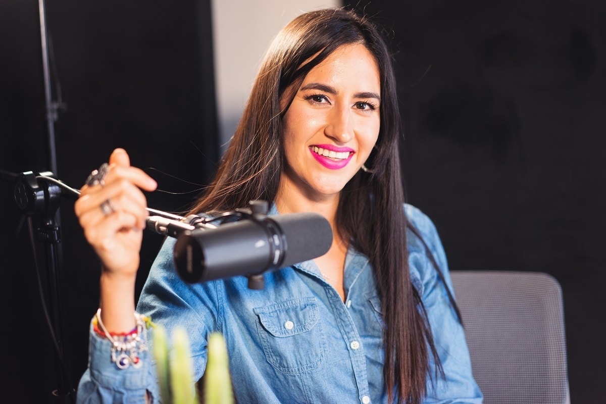 woman hosting a podcast